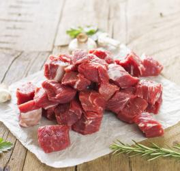Raw marbled diced beef steak